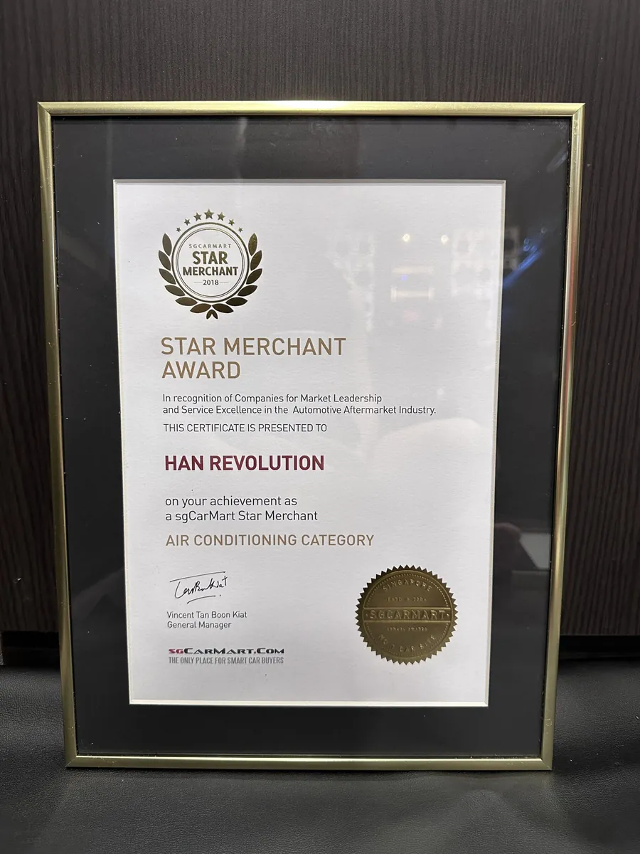 Framed sgCarMart Star Merchant award certificate, air-conditioning category
