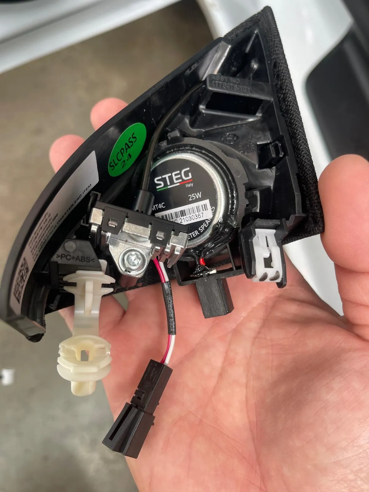 STEG 25 W tweeter on the factory Tesla A-pillar mount, prepared for a plug-and-play install by Han Revolution