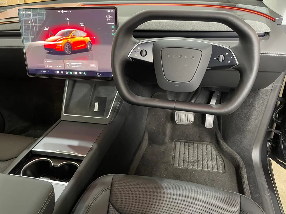 Cybertruck-style steering yoke with the Tesla touchscreen, fitted by Han Revolution